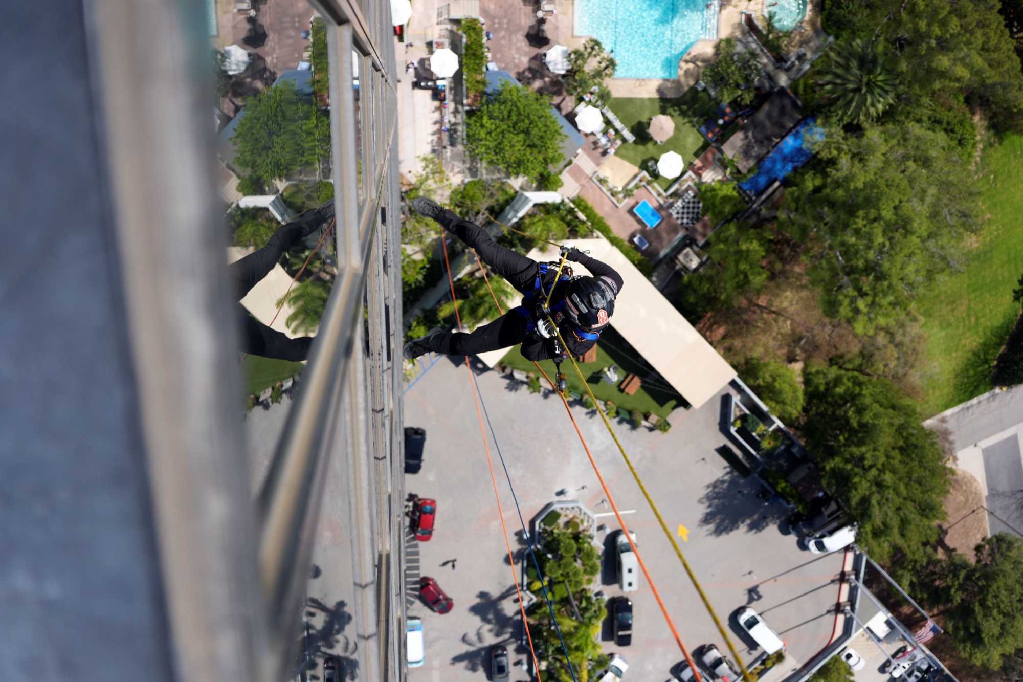 Top-down view of a rappeller on the Union Rescue Mission building